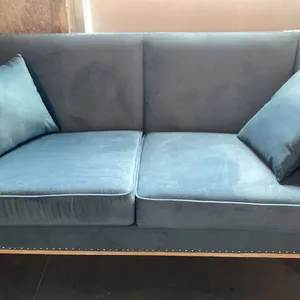 BLUE ULTRAVELVET UPHOLSTERED WITH METAL STUD ACCENTS LOVESEAT WITH 2 THROW CUSHIONS APPROX 62"