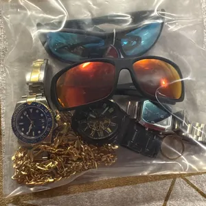 BAG OF JEWELRY , WATCHES AND SKI GLASSES WITH TAGS