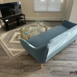 Couch, TV Stand, Coffee Table & Rug
 UNRESERVED