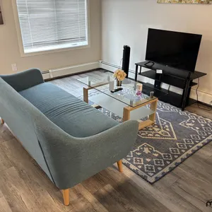 Sofa, Rug & (2) Tables
 UNRESERVED