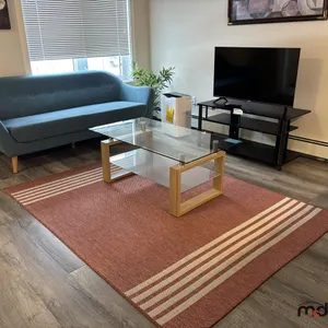 Sofa, Rug & (2) Tables
 UNRESERVED