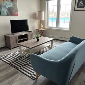 Sofa, Rug & (3) Tables
 UNRESERVED