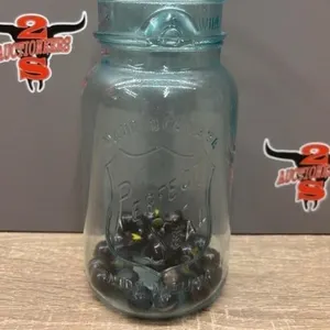 Blue Jar w/Antique Black Marbles.