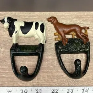 Cast Iron Coat Hooks.