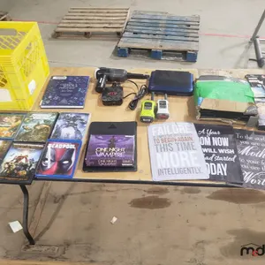 Crate of DVDs, Apple TV, Metal Signs & Walkie Talkies
 UNRESERVED