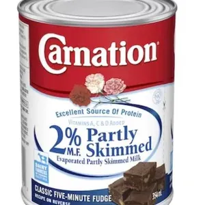 Lot of 7 Carnation 2% 354mL Evaporated Partly Skimmed Milk Cans
