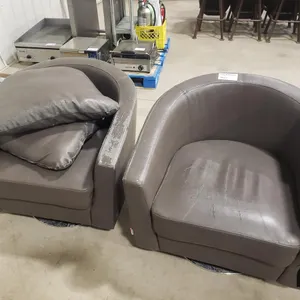 (2) Swivel Leather Lounge Chairs
 UNRESERVED