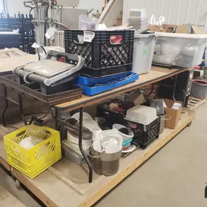 Table of Stainless Food Storage Containers, Serving Plates, Bowls, Coffee Press, Sandwich Press and Misc. Decorations and Items
 UNRESERVED