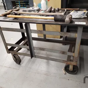 Metal Rolling Table w/ Contents
 UNRESERVED