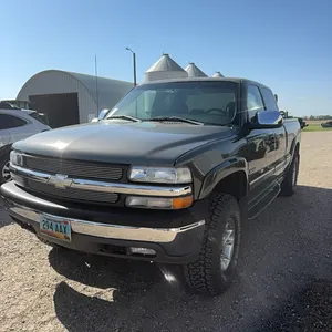 2000 Chevy half ton four-wheel-drive pick up, excellent tires and rims, extended cab, four-door, automatic, 5.3 gas, excellent condition, no rust, 125