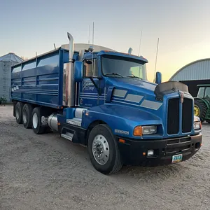 1990 Kenworth T600 tri-axle day cab grain truck, 3406 Cat, 13 speed manual, 815,334 miles, rear hoist controls, three piece swing out gate, roll tarp,