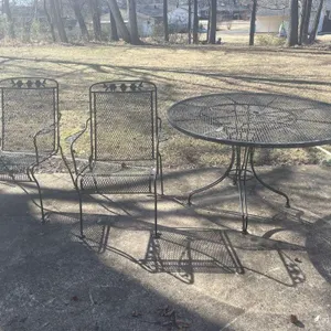 Black round metal table 48inDx28inH and black
