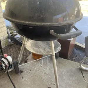 Round charcoal grill extra rack and lighter fluid