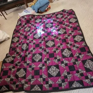 Hand stitched purple/black quilt