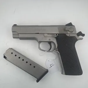 S&W 4566 VBE9141
 Serial# VBE9141
 one 8 round
