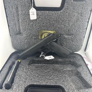 Taurus 1911 9MM
Serial # ACA431273
Two 9 round