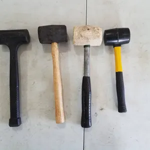 Four Rubber and Mallet Hammers with Varied Handles