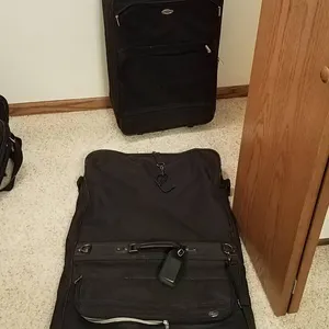 Black Rolling Suitcase and Garment Bag