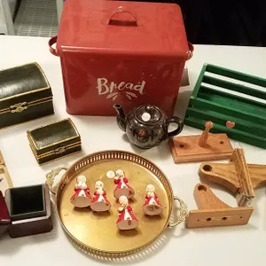 Household Items Including Bread Box, Teapot, and Figurines