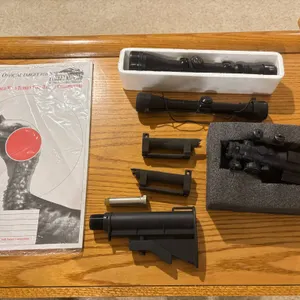Rifle Scopes, Accessories, and Target Sheet