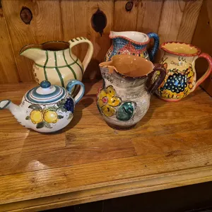 (4) Assorted Ceramic Pitchers, (1) Ceramic Tea Pot