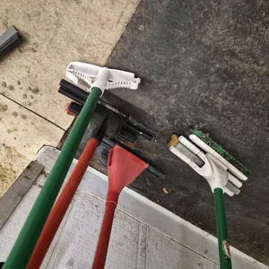 (4) Mop Handles, (1) Floor Squeegee, (1) Wet Floor Sign