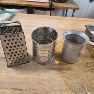 (1) Aluminum 1 qt Measure, (1) Manual Sifter, (1) Tapered Cheese Grater