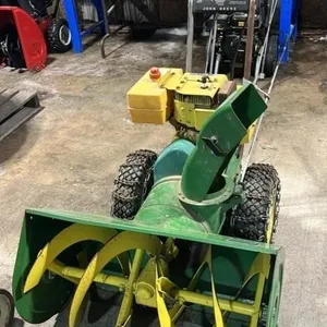 John Deere Model 832 Gas Powered Snowblower.