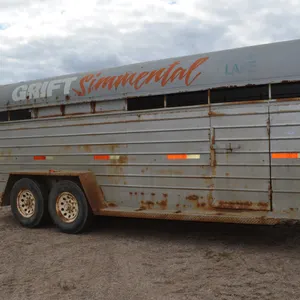 Blue Hills 18' Stock Trailer, new floor and door 2 yrs ago, has some patches on bottom, middle door is rusted, small holes on the bottle wall, 4 new t