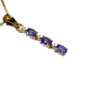 Gold Plated Sterling Silver Natural Tanzanite (0.54ct) Pendant with Gold Plated Sterling Silver Chain, W/A $490.00. Tanzanite is the birthstone for De