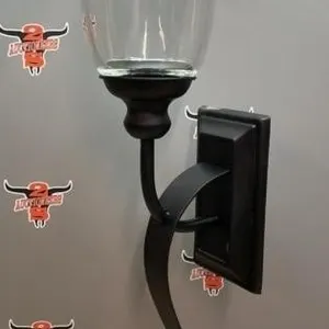 27"H Wall Mount Candle Holder. Donated by Frank