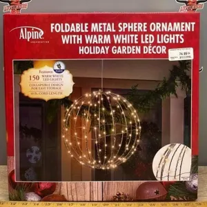 Unused Christmas Sphere Ornament. Donated by