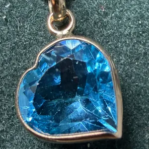 10K BLUE TOPAZ (2CT) HANDCRAFTED HEART DESIGN PENDANT, SUGGESTED RETAIL VALUE $600