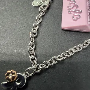 SILVER (3.54G), DIAMOND TWO-TONE BRACELET, RHODIUM PLATED, SUGGESTED RETAIL VALUE $240