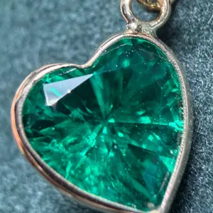 10K  LAB EMERALD (1.15CT) HANDCRAFTED HEART PENDANT, SUGGESTED RETAIL VALUE $800