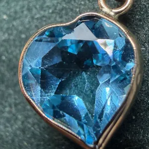 10K BLUE TOPAZ (2CT) HEART PENDANT SUGGESTED RETAIL VALUE $800