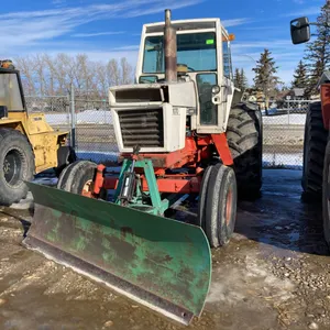 1977 Case 1070 Tractor with 8' Blade SN not visible.  A3 - Box of misc. parts