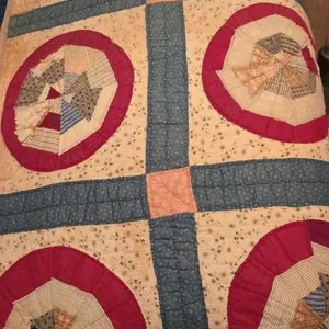 Vintage hand stitched quilt with imperfections