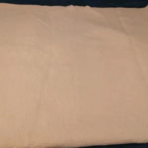 Light pink twin quilt