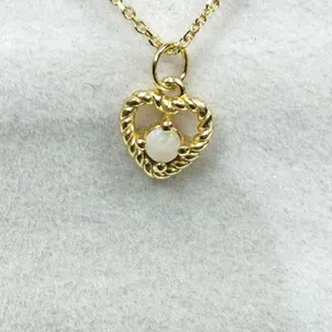 Gold Plated Sterling Silver Natural Opal Heart Shape Pendant with Gold Plated Sterling Silver Chain, Retail $400.00. Opal is the birthstone for Octobe