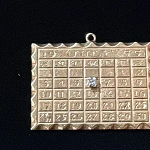 APPROX 14K PENDANT SET WITH DIAMOND (.04CT, 13.8G)