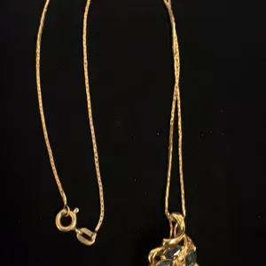 APPROX 10K CHAIN (16") WITH APPROX 14K PENDANT SET WITH SAPPHIRES (6G)