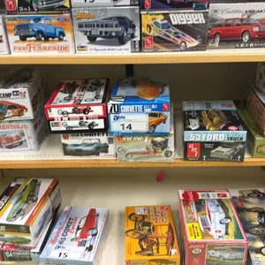 SHELF OF ASSORTED MODEL CARS INCLUDING; AMI 1953 FORD PICKUP TRUCK, AMI INFINITY, AMI 1953