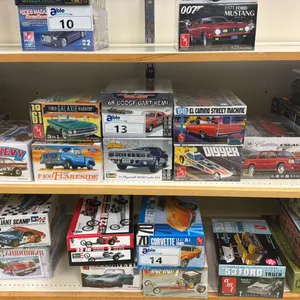 SHELF OF ASSORTED MODEL CARS INCLUDING; AMI 1961 FORD GALAXIE HARDTOP, MONOGRAM PLYMOUTH GTX, AMI