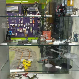 CONTENTS OF SHOWCASE INCLUDING; ANIME FIGURINES, MODEL CARS, MODEL PLANES & MORE