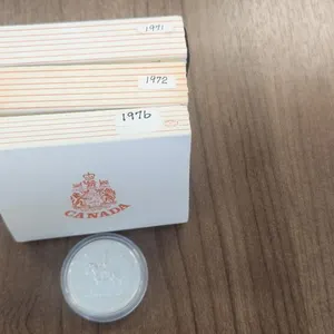 1971, 72, & 76 Royal Canadian Mint Cased Silver $1 Coins & 1973 Encapsulated Silver $1 Coin (some nicely toned)
 UNRESERVED