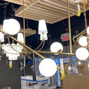 5 LIGHT BRASS CHANDELIER. 44" ACROSS