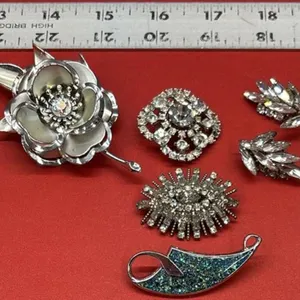 4 Asst. Silver Tone Brooches & Set Of Clip On