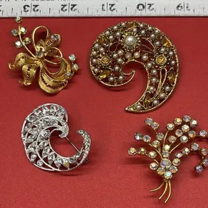 4 Asst. Brooches. *SC