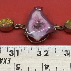 .925 Silver Bracelet w/Pink Stone in the Middle.